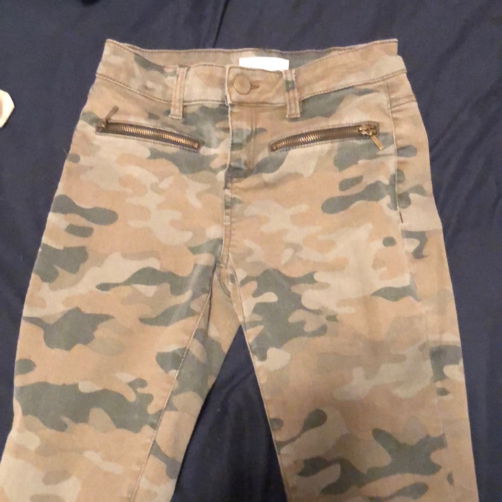Size 3 camouflage jean pants.